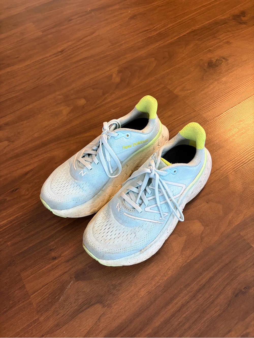 New Balance Pale Blue Sneakers with Neon Yellow Heel Detail